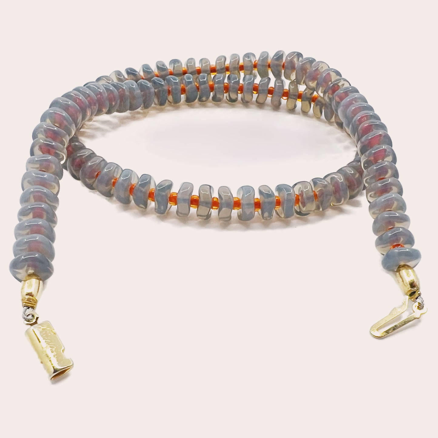 Grey Disk and Orange Necklace