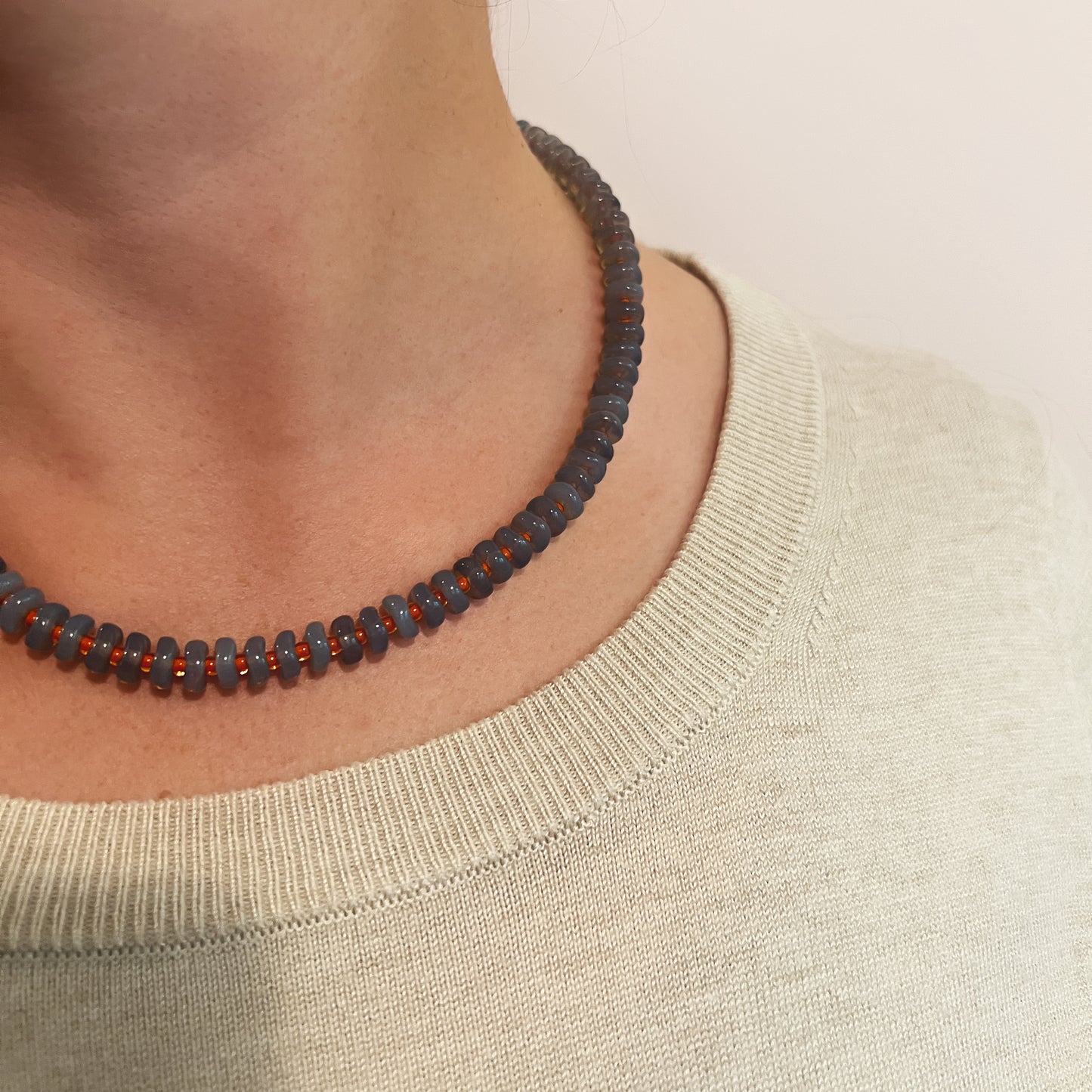 Grey Disk and Orange Necklace